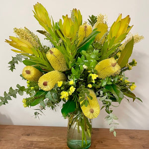 Seasonal Arrangement in Glass Vase