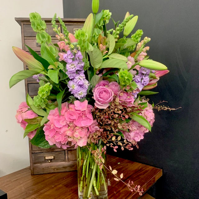 Seasonal Arrangement in Glass Vase