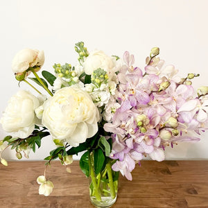 Seasonal Arrangement in Glass Vase