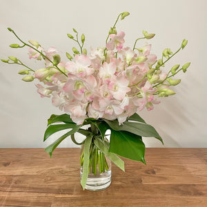 Seasonal Arrangement in Glass Vase