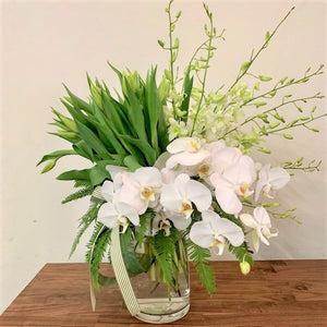 Seasonal Arrangement in Glass Vase